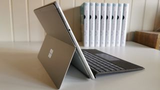 A photograph of the Microsoft Surface Pro 8 from the side on a desk