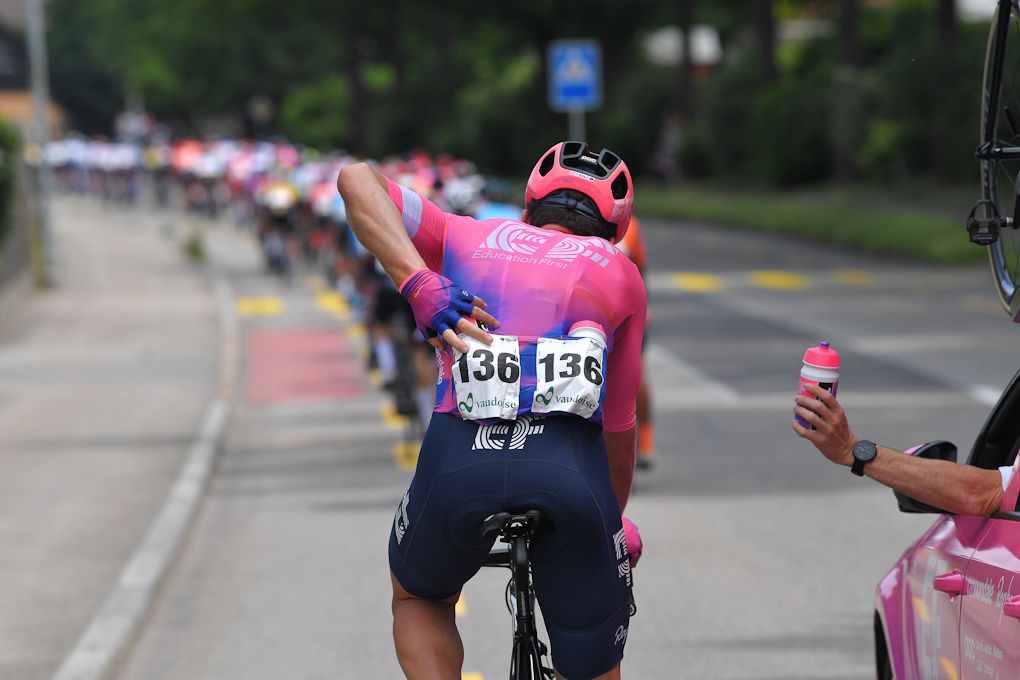 Picking up some bottles at Tour de Suisse