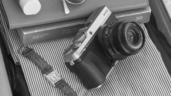 Silver and black camera.