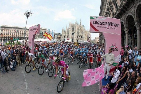 The Giro d'Italia jersey holders lead the peloton off the start line on the Piazza del Duomo.
