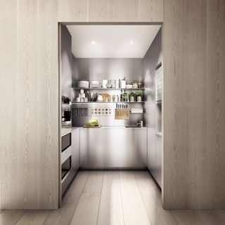 A section of the kitchen with appliances enclosed