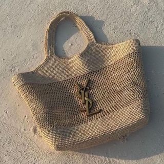 Hannah Strafford Taylor YSL Basket Bag on beach