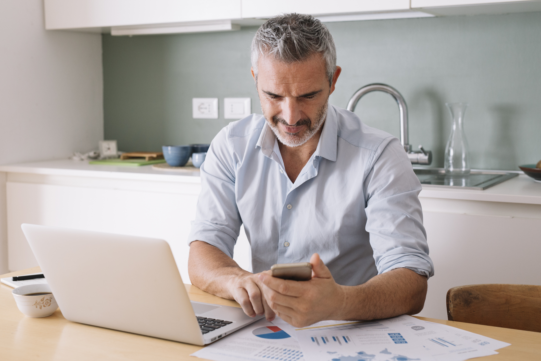 Man deciding whether to invest a lump sum in his kitchen