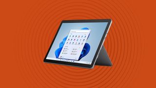 Microsoft Surface Go on an orange background