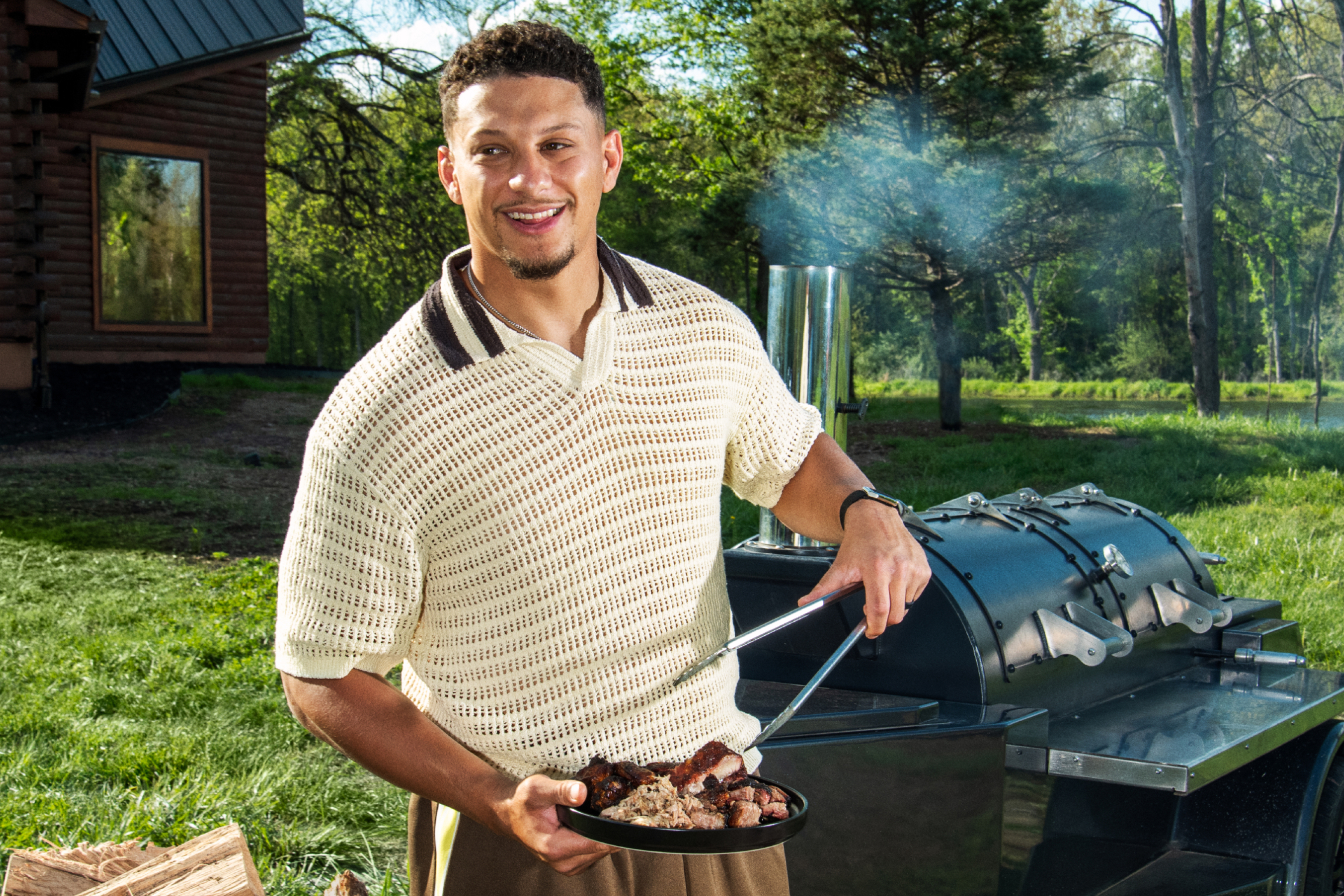 Patrick Mahomes cooking bbq as part of Airbnb Originals experience