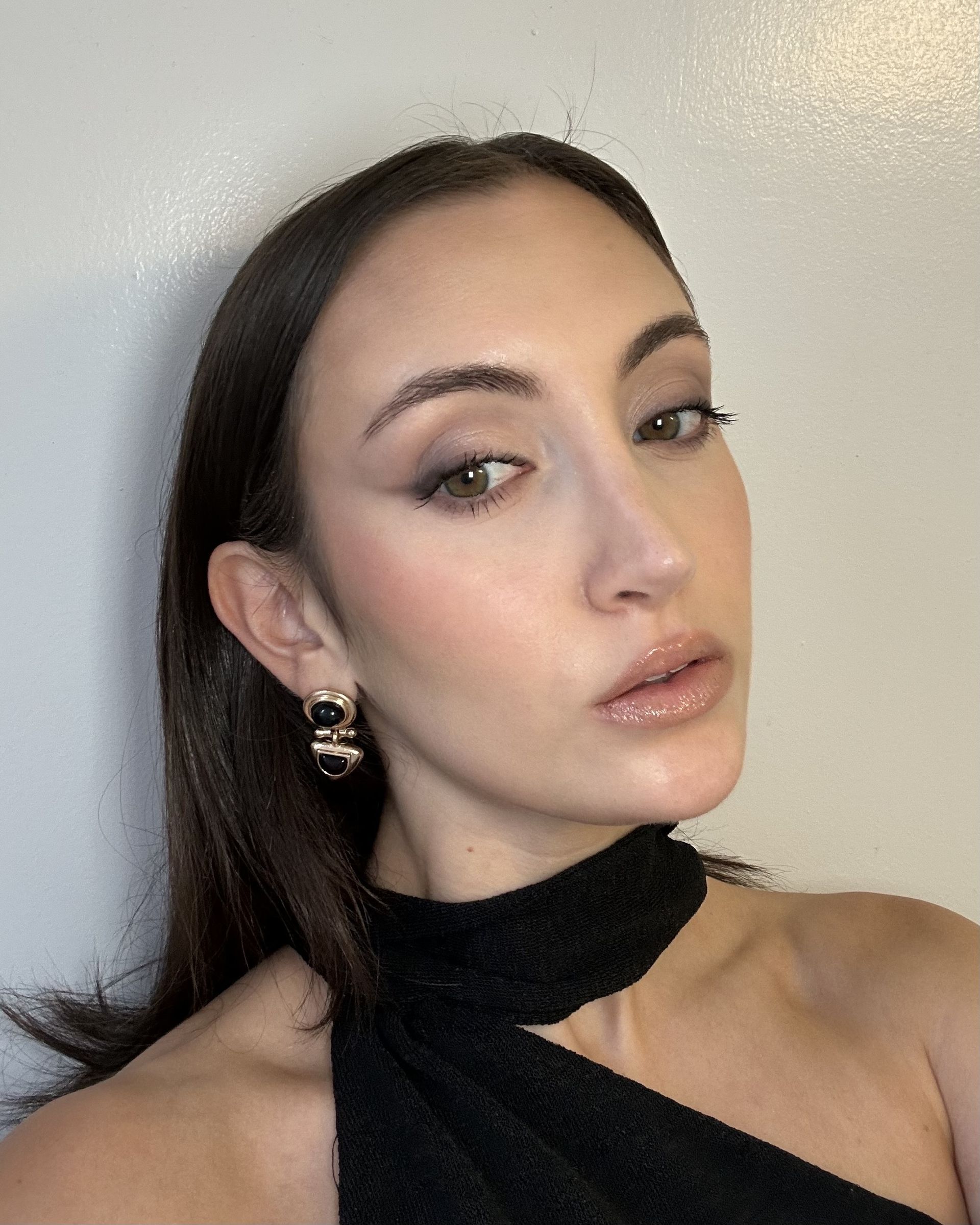 Associate beauty editor Alyssa Brascia wearing the SheGlam Buttery Bliss Blush Stick in Hush Hush.