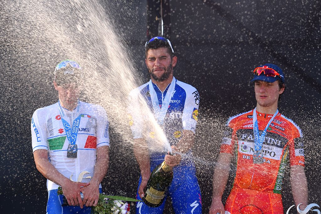 Fernando Gaviria spraying the winners champagne