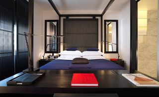 Bedroom at La Suite West hotel in London