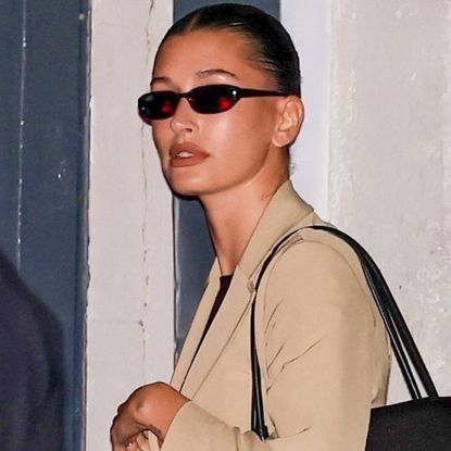 Hailey Bieber traded her flip-flop kitten heels for peep-toe mules inspired by spring's doll heels shoe trend