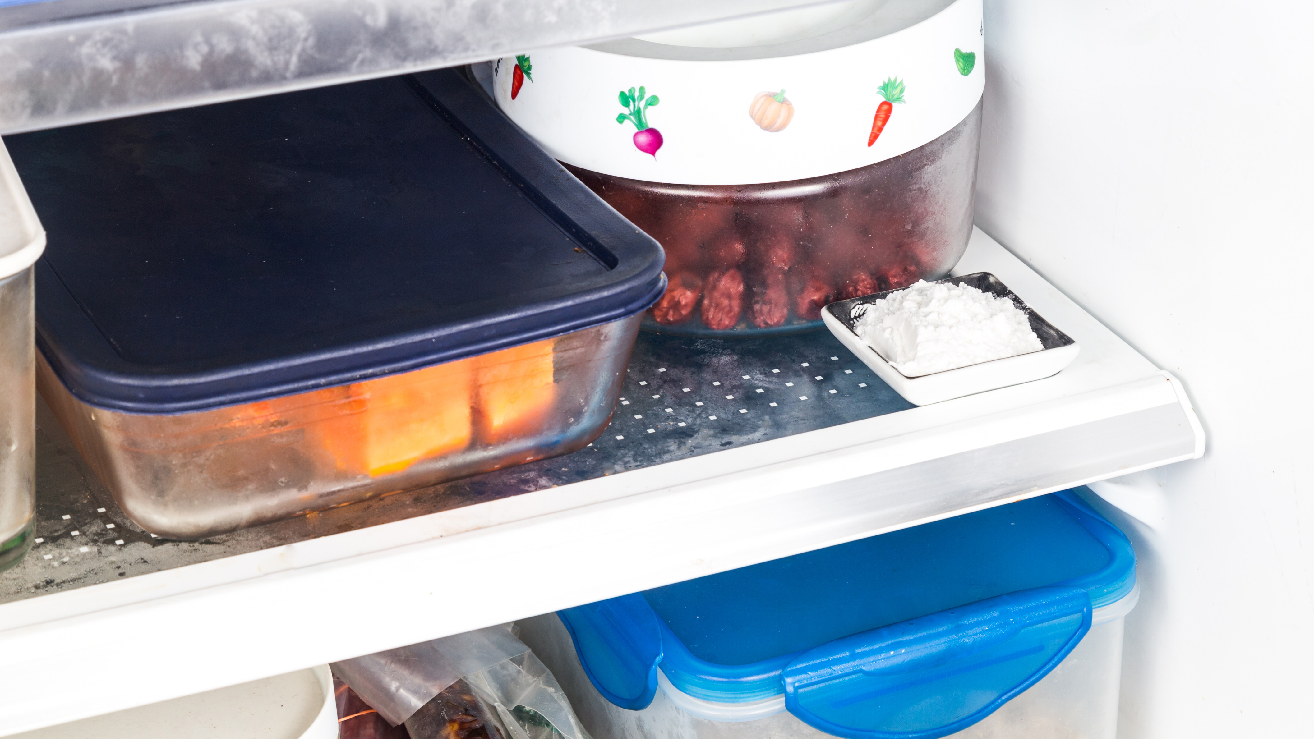 Baking soda on the refrigerator shelf