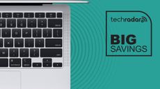 macbook air keyboard against blue background