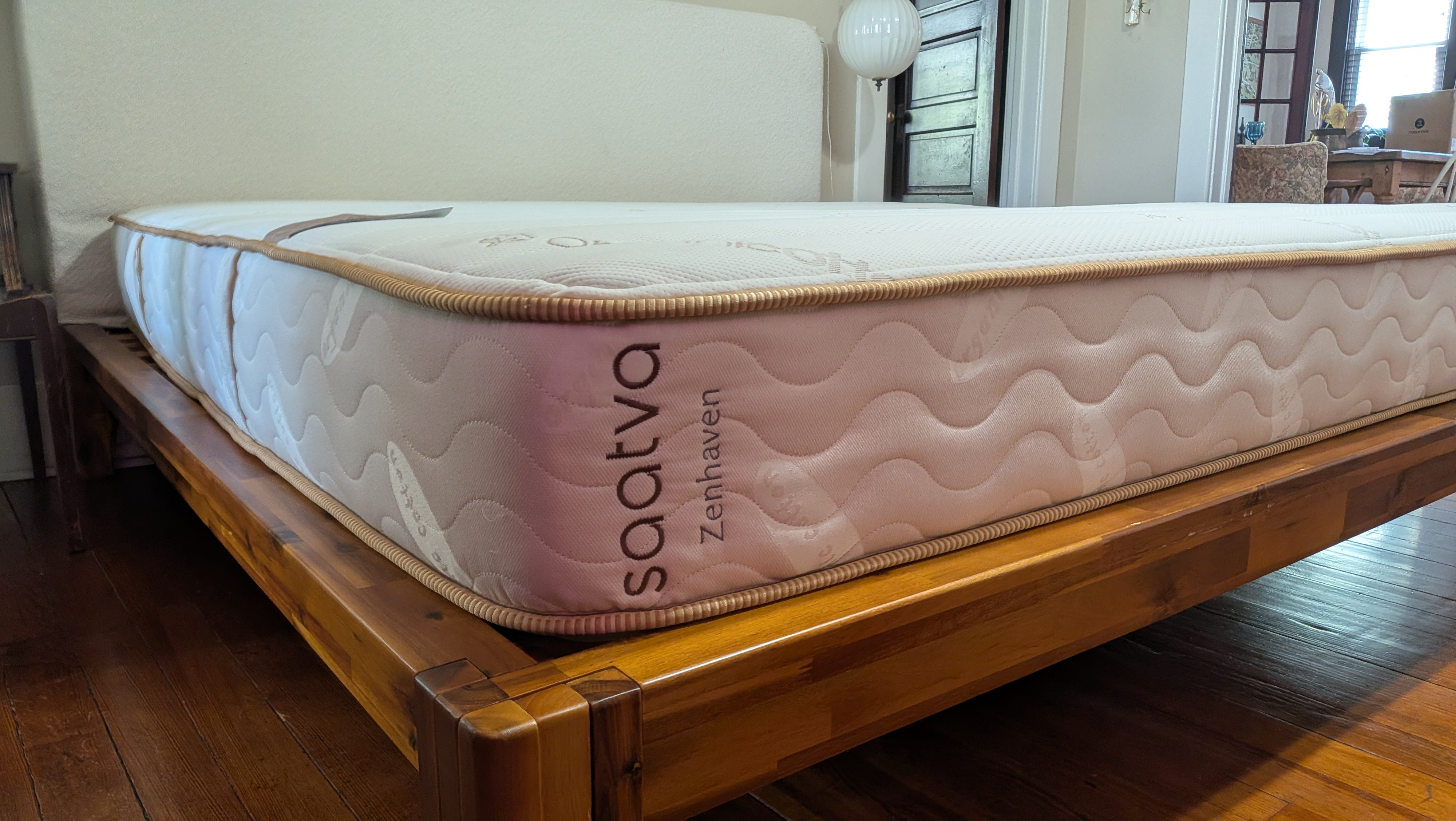 A shot of the Saatva Zenhaven Latex mattress on the bed frame of our Tom's Guide mattress tester.