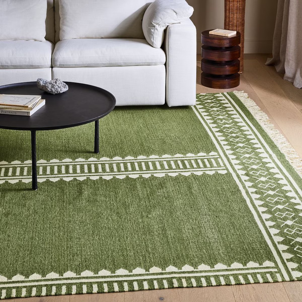 green woven patterned rug