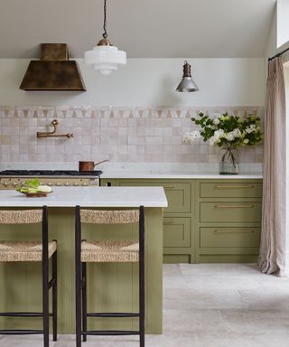 Green shaker kitchen with zellige splashback tiles