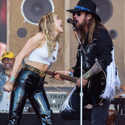 Miley Cyrus and Billy Ray Cyrus perform on the Pyramid Stage during day five of Glastonbury Festival at Worthy Farm, Pilton on June 30, 2019 in Glastonbury, England.