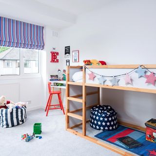 bedroom with two storey double sleeper bunk bed and window