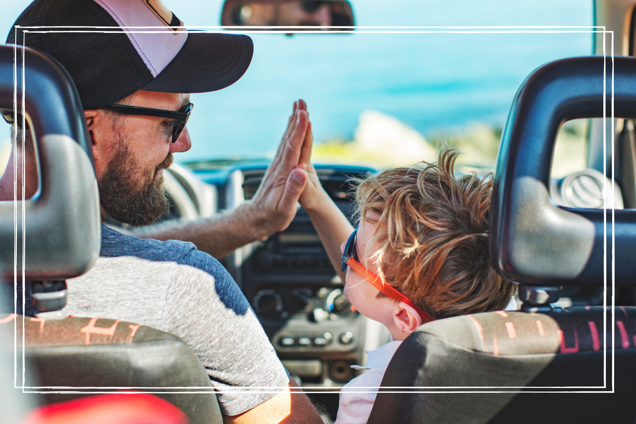 Road trip. Father and son travelling together by car