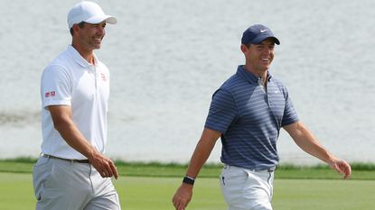 Adam Scott and Rory McIlroy, playing partners on day 1 of the Arnold Palmer Invitational, where Rory took the lead with an opening 65