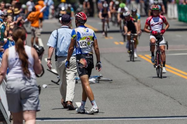 Alexy Schmidt (Team Type 1) walks back to his bike after walking over the finish line.