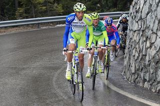 Eros Capecchi (Liquigas-Cannondale), followed by teammate Sylvester Szmyd, sets the pace on the Passo Pordoi.