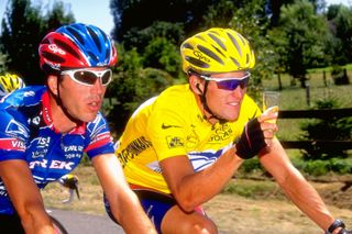 25 Jul 1999: Lance Armstrong of the USA and USP toasts his victory after winning the 1999 Tour de France between Arpajon and Paris France Mandatory Credit Doug Pensinger Allsport