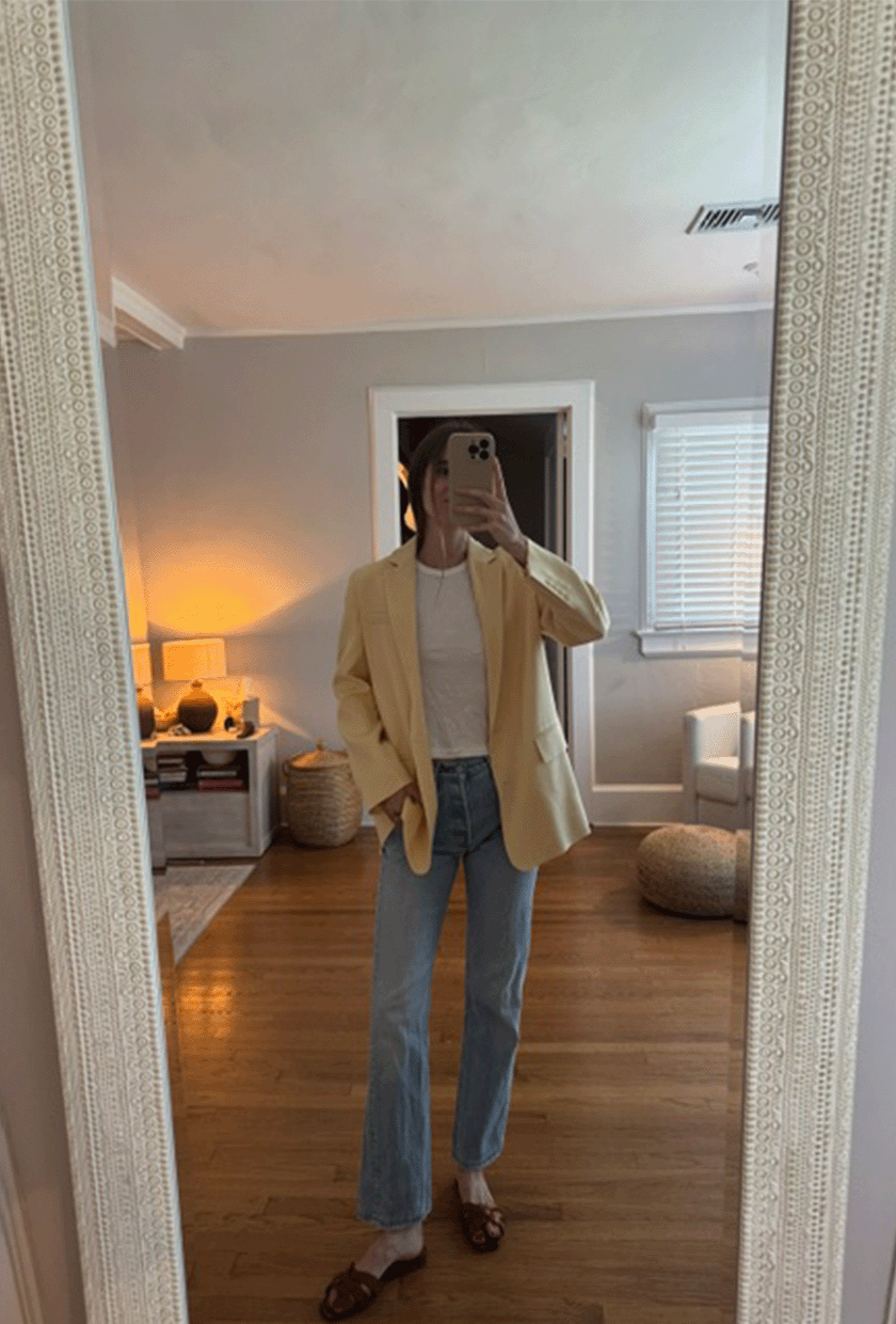 Tessa Faye O'Connell wearing a butter yellow blazer.