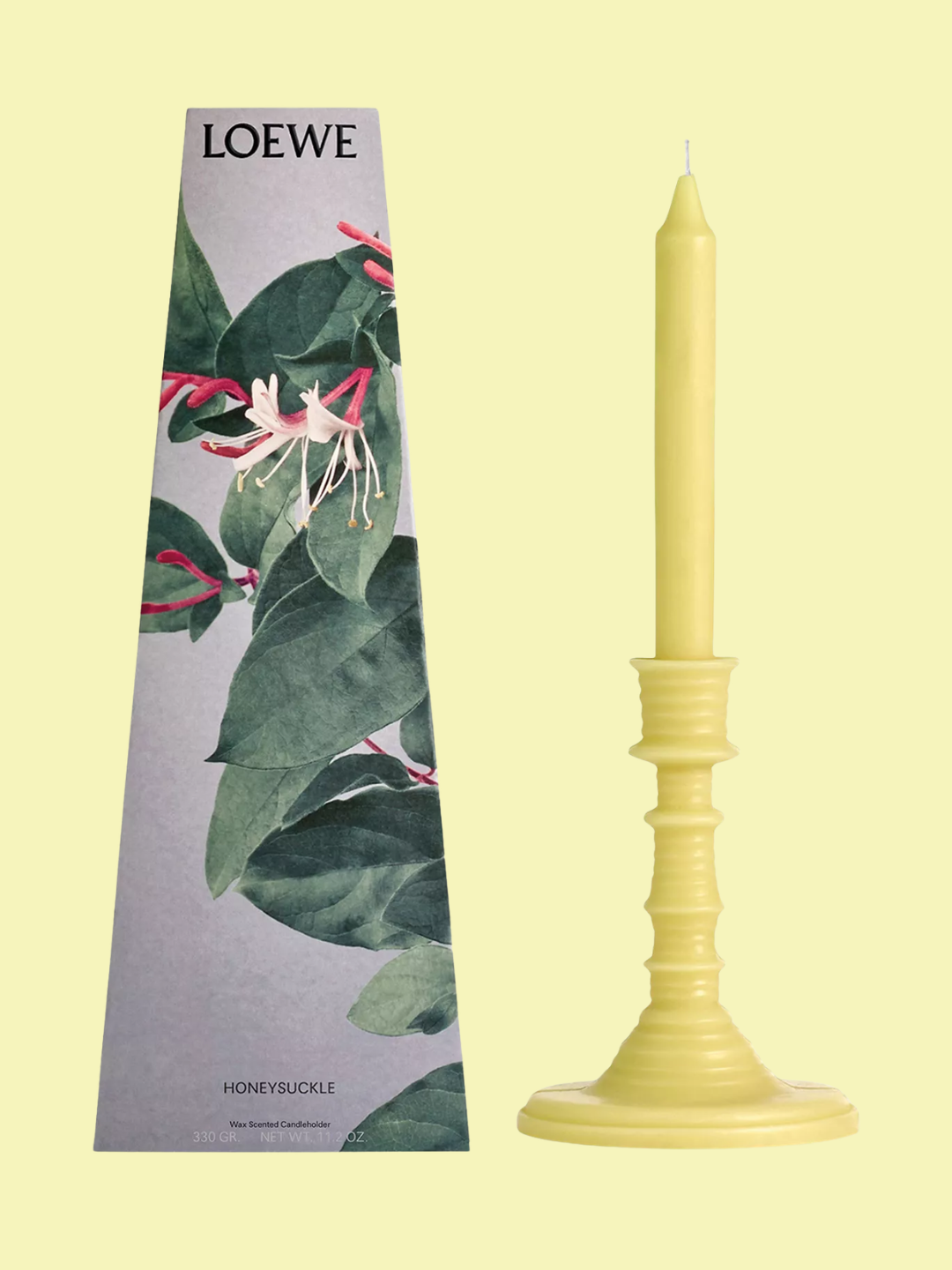 A tapered scented honeysuckle candle from Loewe