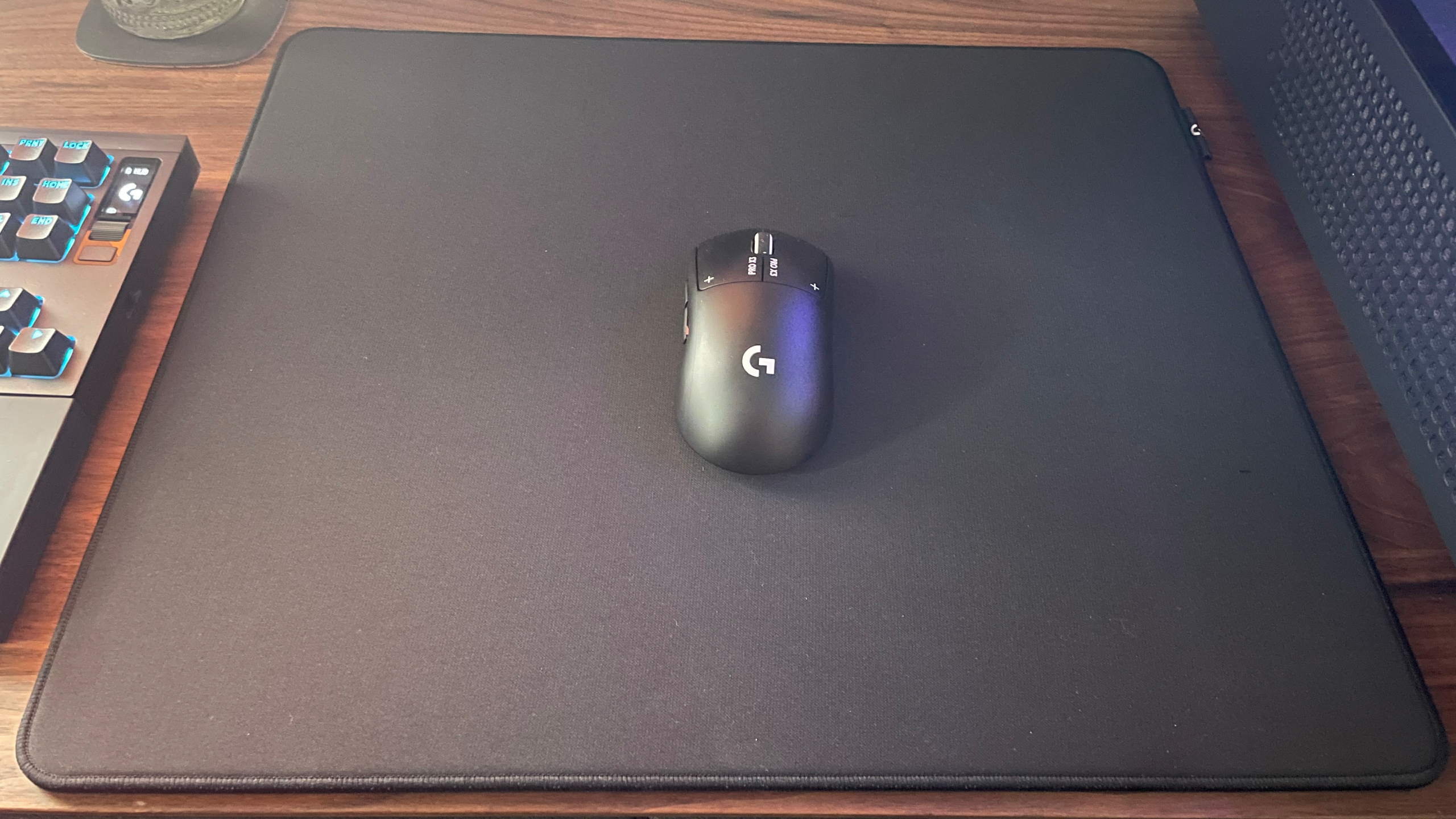 A Logitech G Pro X Control mouse pad with a G Pro X3 Superstrike mouse on top.