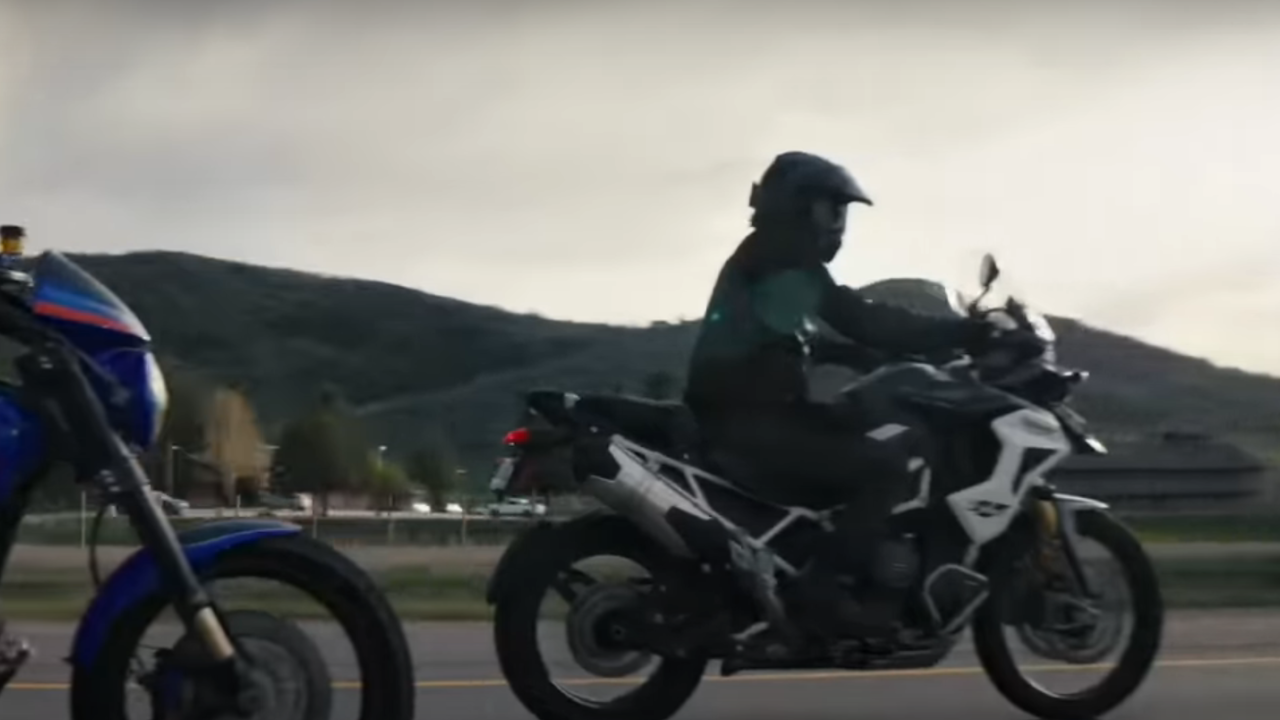 Norman Reedus, a star of The Bikeriders, driving a motorcyle with his guest in Ride with Norman Reedus.