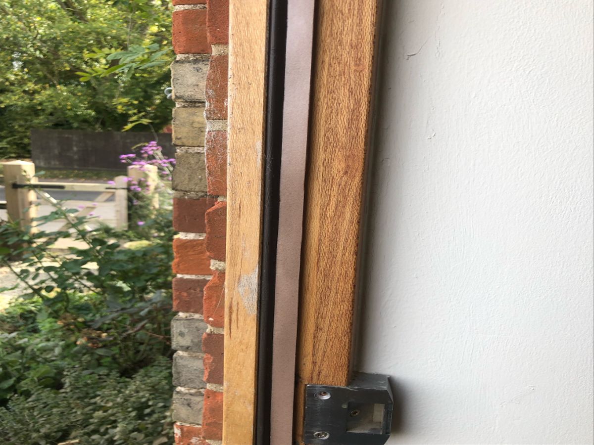 The foam tape affixed to the door frame