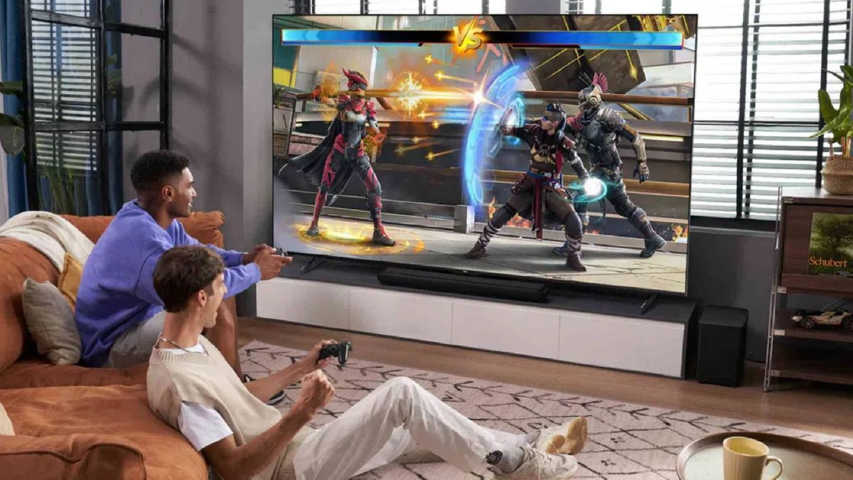 Best TV deals Two men playing a fighting game on an LCD TV