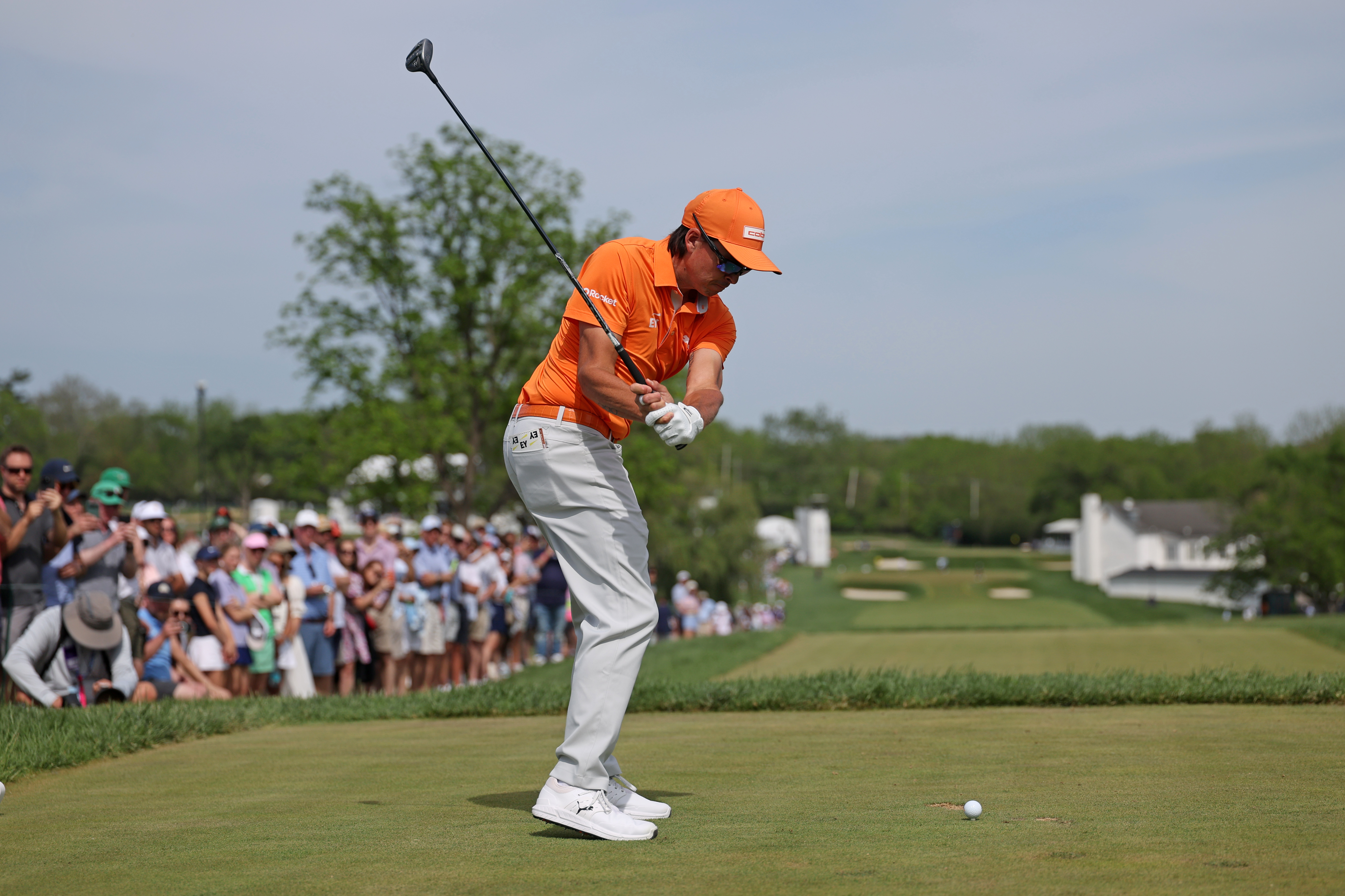 Rickie Fowler midway through his swing