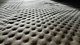 Saatva Foam Mattress Topper Review: Close-up of organic cotton cover
