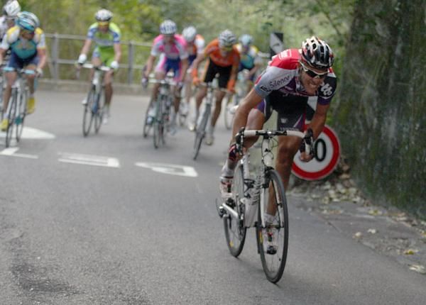 Philippe Gilbert (Silence-Lotto) makes a powerful attack on the San Fermo Della Battaglia.
