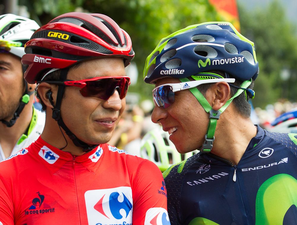 Colombians Darwin Atapuma and Nairo Quintana talk before the start of stage 7