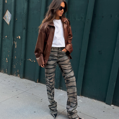 An image of a woman wearing cool fall pants outfit 2026