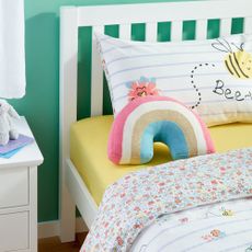 kids room with turquoise green wall and wooden white bed on wooden floor