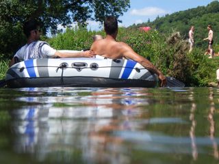 Sample image of two men in a raft, on a lake, taken with the Pentax WG-90