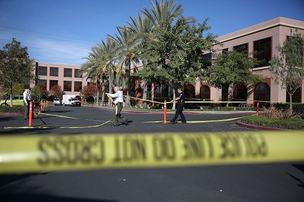 Police tape around the Inland Regional Center.