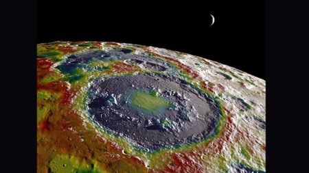 A heat map of the surface of the moon showing a large dark blue circle of a meteorite crater