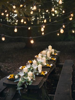 festoon light ideas: night time lighting from lights4un on outdoor table