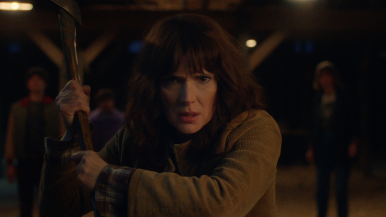 Joyce wielding her axe in Stranger Things Season 5