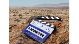 clapperboard on a beach with the word Eddington on it