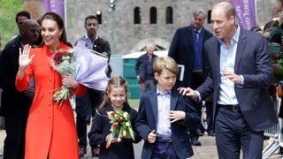 Catherine, Duchess of Cambridge, Princess Charlotte of Cambridge, Prince George of Cambridge and Prince William, Duke of Cambridge during a visit to Cardiff Castle