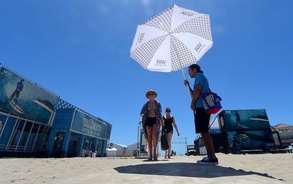 People beat the heat at the beach in Southern California.