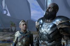 Kratos and Atreus in Alfheim, both wearing silver and gold armor