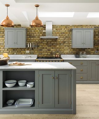 Grey kitchen ideas with exposed brickwork walls