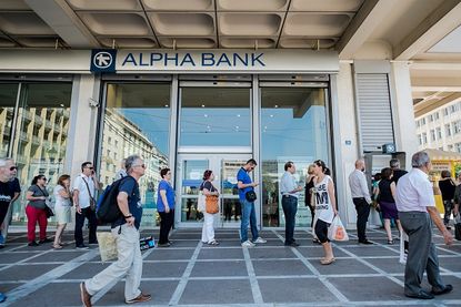 A line outside of a Greek bank.
