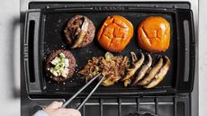 Griddle with burgers and buns