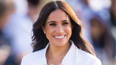 Meghan, Duchess of Sussex attends a reception for friends and family of competitors of the Invictus Games at Nations Home at Zuiderpark on April 15, 2022